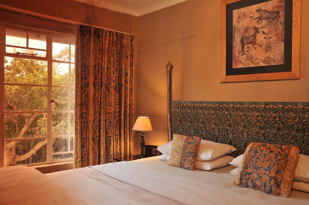 Bed and Breakfast Sunset Manor Mbombela Habitación foto